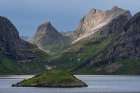 Norway, Lofoten. Island in fjord and mountain landscape. Art Print